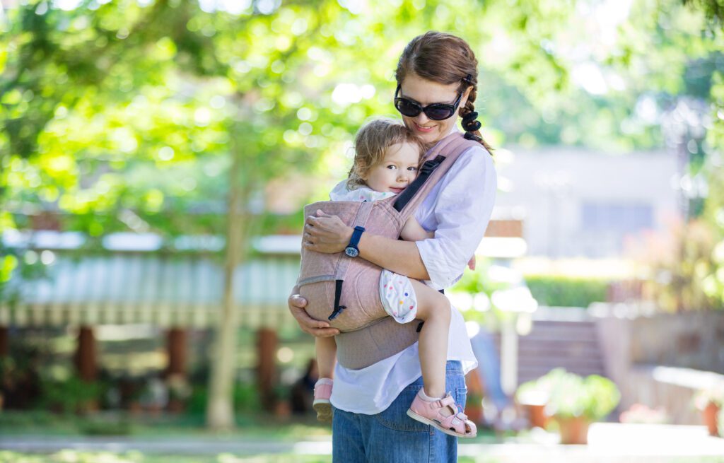 women using baby carrier to make life easier