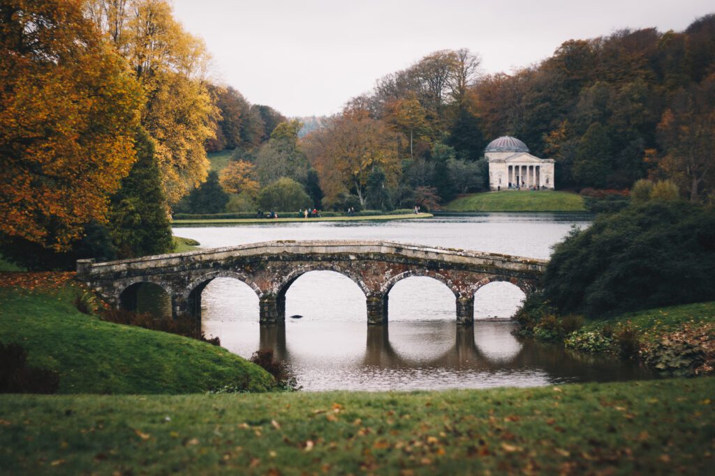 arched historical bridge in stourhead park stourt 2023 02 28 05 58 11 utc