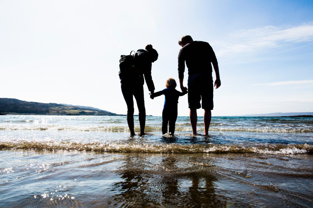 family holding hands on beach loch eishort isle 2022 03 07 23 59 41 utc 1